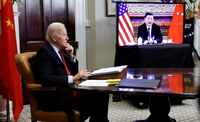 U.S. President Joe Biden speaks virtually with Chinese leader Xi Jinping from the White House in Washington, U.S. November 15, 2021. (REUTERS)