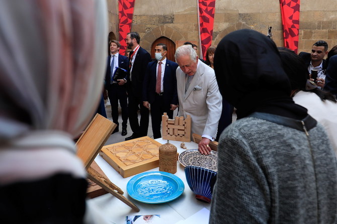 Britain's Prince Charles visits Bayt Al-Razzaz Palace in the Darb Al-Ahmar neighbourhood of old Cairo. (AP)