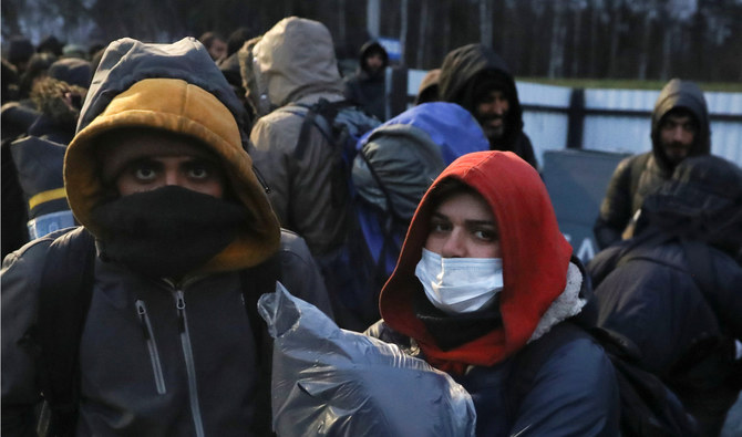 Belarus clears migrant camp at border with Poland