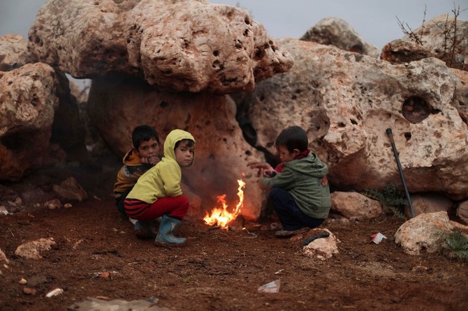 Displaced Syrians face brutal winter exacerbated by economic collapse, charity warns