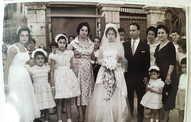 A Jewish wedding party on the street next to the synagogue in Wadi Abu Jamil, Beirut, June 2 1957. (João Luis Koifman)