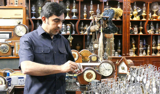 Pakistani clock collector records passage of time