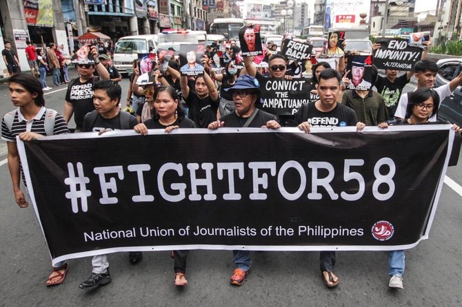 Filipino journalist shot dead while watching TV in store