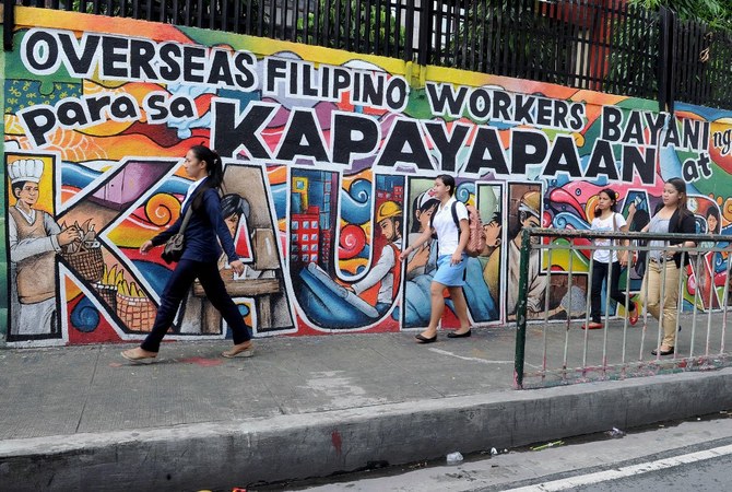 Philippine president Duterte signs into law creating a department for overseas Filipino workers