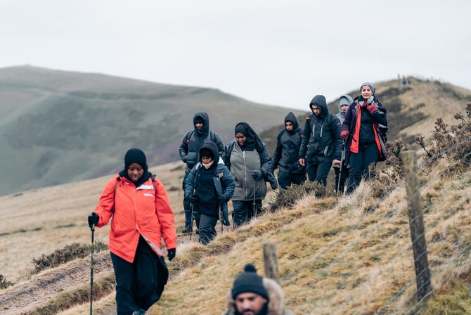 One of the hikers, who shared photos from the Christmas Day walk in England’s Peak District, said they had seen a comment “comparing the walkers to the Serengeti wildebeest migration.” (Twitter/@Muslim_Hikers)