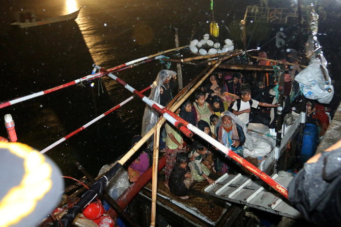 Bowing to international pressure, Indonesia allows stricken boat with over 100 Rohingya refugees to dock