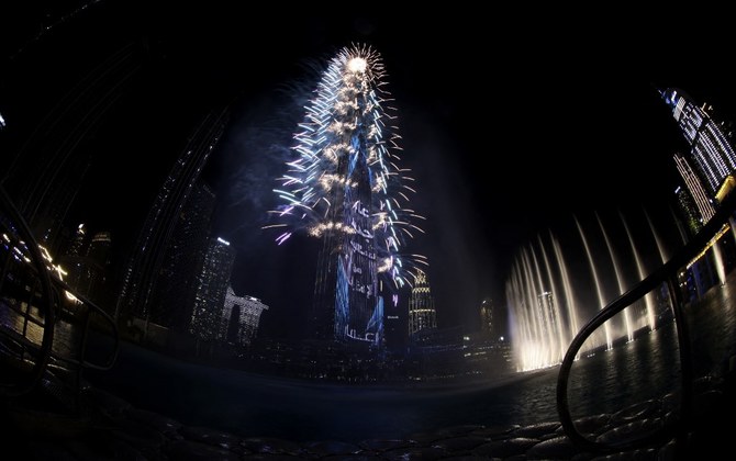 New Year's Eve fireworks lighting the landmark Burj Khalifa tower at midnight in Dubai. (AFP)