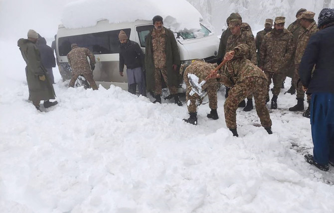 Army troops take part in a rescue operation in a heavy snowfall-hit area in Murree, some 45 km north of the capital of Islamabad, Pakistan. (AP)