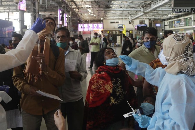India reports 264,202 new coronavirus infections in past 24 hours