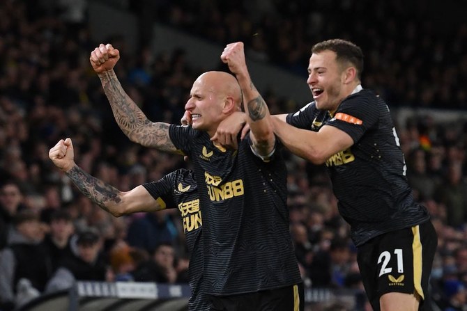 Newcastle United's English midfielder Jonjo Shelvey (C) celebrates with teammates after scoring the opening goal of the English Premier League football match between Leeds United and Newcastle United at Elland Road. (AFP)