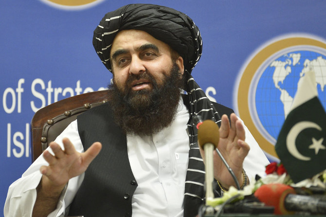Afghanistan's acting Foreign Minister Amir Khan Muttaqi gestures while speaking during an event held in the Institute of Strategic Studies in Islamabad on November 12, 2021. (AFP)