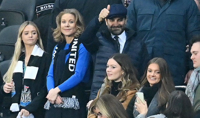 Newcastle United's English minority owner Amanda Staveley (2nd L) and her husband Mehrdad Ghodoussi (C) at St James' Park in Newcastle-upon-Tyne, north east England on December 27, 2021. (AFP)