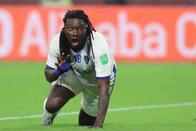 Bafetimbi Gomis' famous lion celebration in which he gets down and paces on all fours after scoring has become iconic for Al-Hilal fans. (AFP/File Photo)