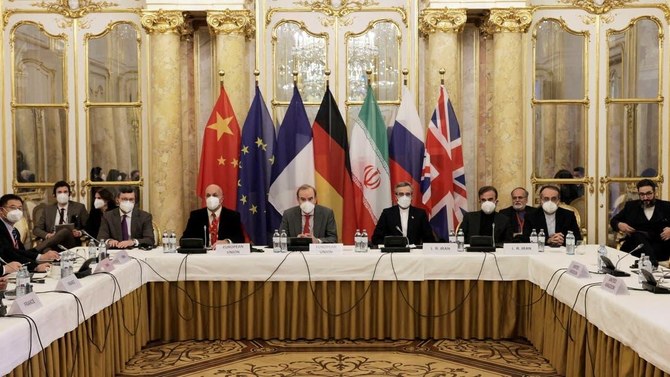 Delegations waiting for the start of a meeting of the JCPOA in Vienna, in December 2021. (AFP/File Photo)