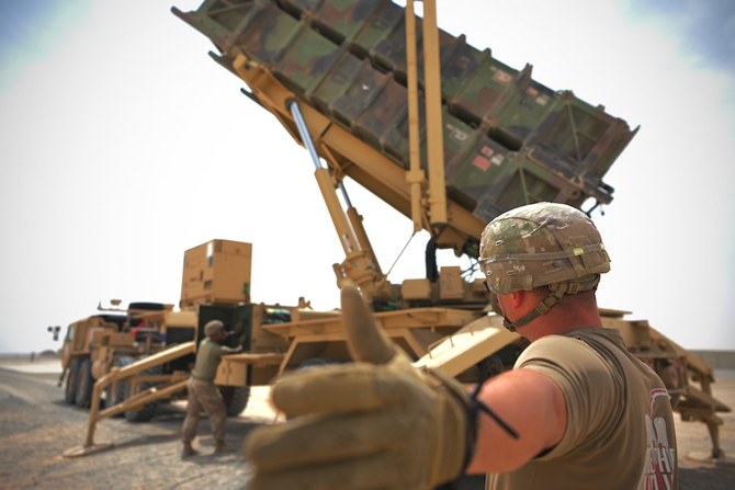 ILLUSTRATIVE: US soldiers near a Patriot missile battery at Al-Dhafra Air Base in Abu Dhabi, UAE in May, 2021. (AP/File Photo)