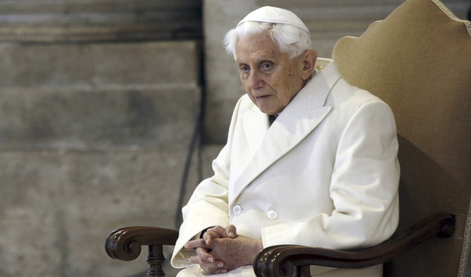 This Dec. 8, 2015 file photo shows Pope Emeritus Benedict XVI sitting in St. Peter's Basilica as he attends the ceremony marking the start of the Holy Year. (AP)