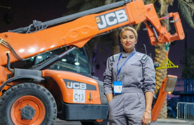 Merryhan Al-Baz, 30-year-old Saudi woman with passion for motors and engines, becomes the world’s first female crane driver in race competitions. (Supplied)