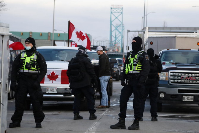 Defiant protesters remain at key US Canada border crossing