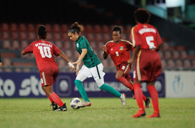 The Saudi Arabian women's national football team, in green, defeated the Seychelles 2-0 in their first ever international match. (Supplied)