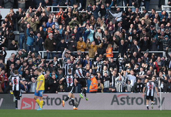 Newcastle United's Fabian Schar celebrates scoring their second goal against Brighton & Hove Albion. (Action Images via Reuters)