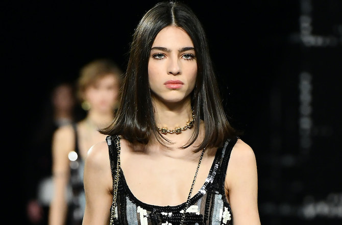 Models pay homage to Tweed on Chanel runway in Paris