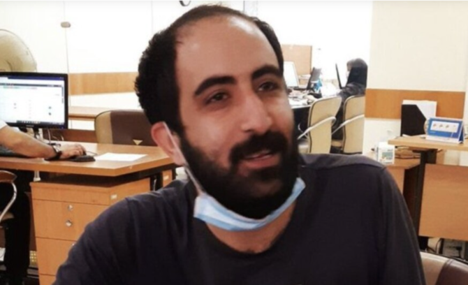 Amir-Abbas Azarmvand, a financial reporter for state-run economic newspaper SMT, had been arrested in September 2021. (Screenshot/Social Media)