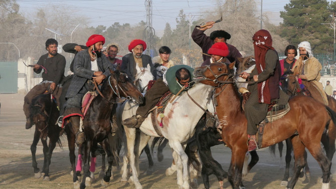 Buzkashi players from the Khurasan and Arayana clubs seen on their horses at Quetta’s Hockey Ground on March 11, 2022. (AN photo)