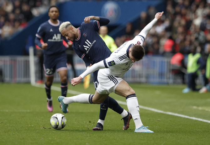 Paris St Germain's Neymar in action with Bordeaux's Danylo Ignatenko in Paris on March 13, 2022. (REUTERS/Benoit Tessier)