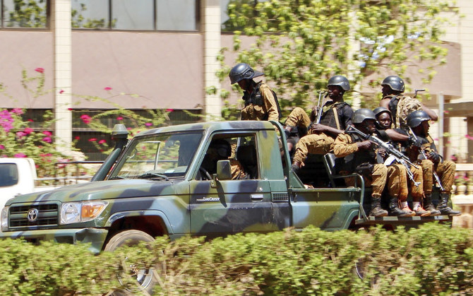 Troops ride in a vehicle in central Ouagadougou, Burkina Faso. (AP file photo)