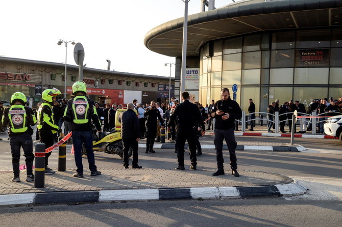 Four dead in Israel stabbing, car-ramming, assailant shot