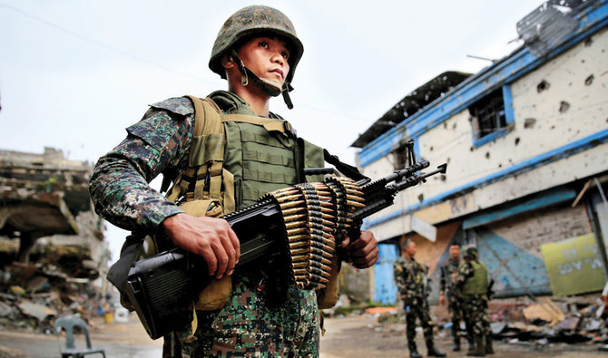 A soldier stands guard in Marawi City, where a five-month operation to reclaim the city has seen  a decline in ASG-related incidents. (Reuters/File Photo)