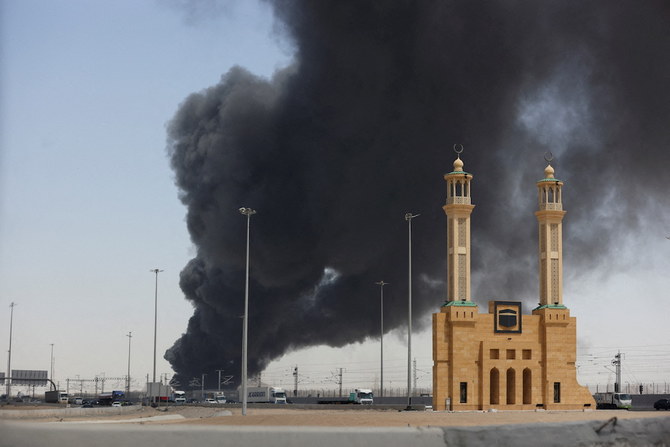 Smoke billows from a Saudi Aramco's petroleum storage facility after an attack in Jeddah, Saudi Arabia March 26, 2022. (Reuters)