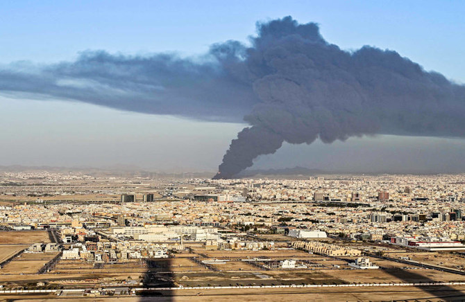 Smoke billows from an oil storage facility in Saudi Arabia's Red Sea coastal city of Jeddah on March 25, 2022. (AFP)