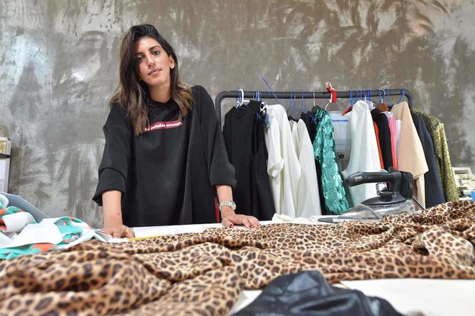 Saudi fashion designer, Arwa Al-Banawi, in her studio. (AFP)