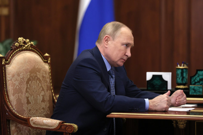 UK spy chief says Putin advisers fear telling truth on Ukraine