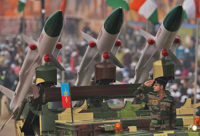 A soldier salutes next to an Akash missile system during India's 73rd Republic Day parade at the Rajpath in New Delhi, India, on January 26, 2022. (AFP/File Photo)