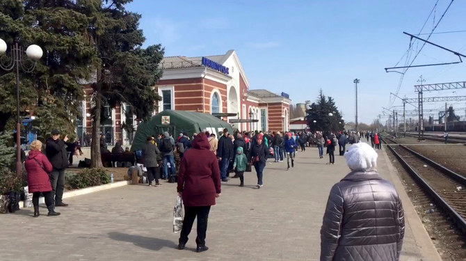 Civilians flee eastern Ukraine after deadly railway station attack