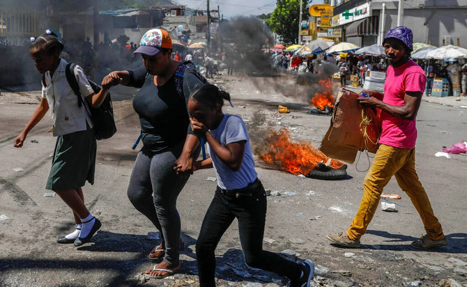 New gang fighting in Haiti kills 20, displaces thousands
