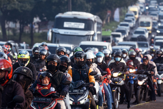 Millions of Indonesians stuck in huge traffic jams as annual Eid exodus returns