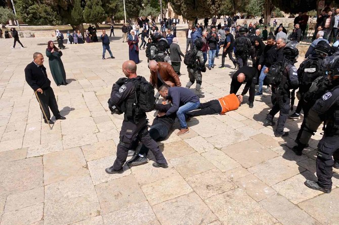 Arrests, injuries as baton-wielding police target Palestinian Al-Aqsa protest