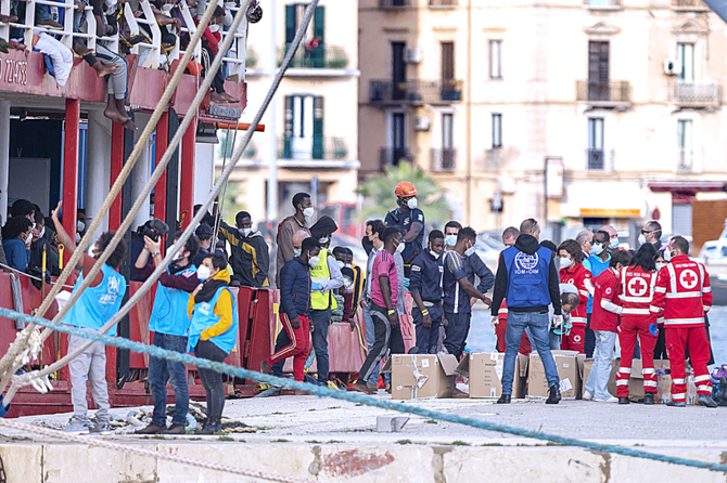 Italian rescuers save over 100 migrants, find 2 bodies