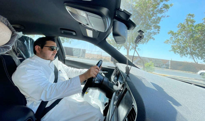 Majed Al-Shikhi, an auto expert and car reviewer, demonstrates how dashcams can be installed and used by motorists. (Supplied)