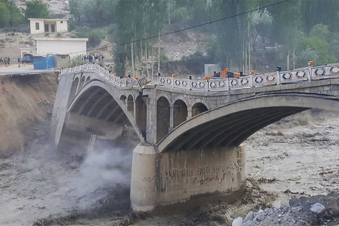 Flash flooding sweeps away Pakistan bridge