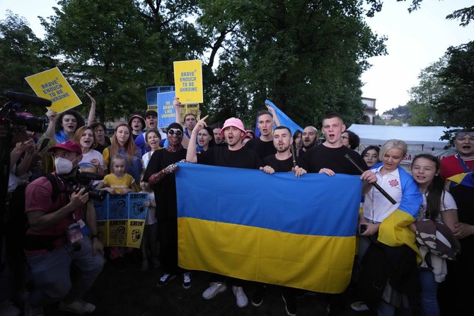 Ukraine’s Kalush Orchestra seek to lift spirits at Eurovision