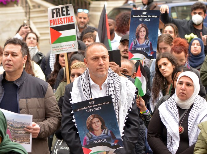 Mourners pay tribute to slain Palestinian journalist in London