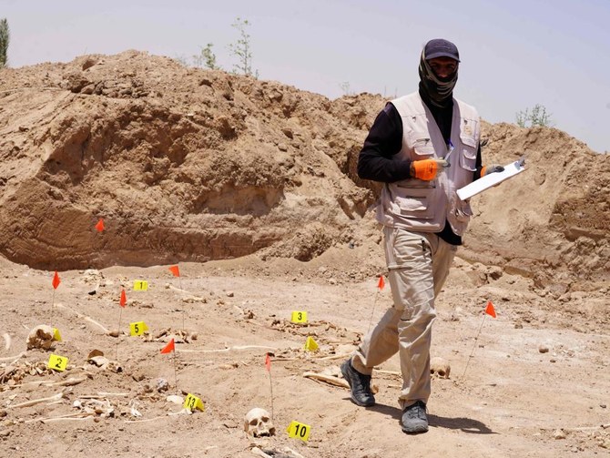 Iraq exhumes remains of Saddam-era victims from mass grave