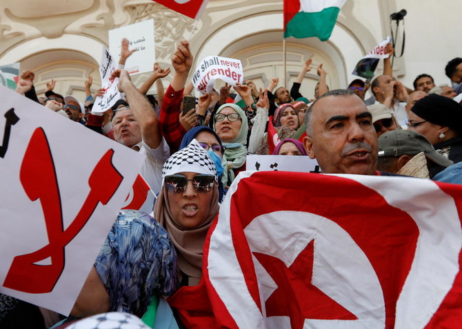 Thousands in Tunisia protest against president, demand democratic return