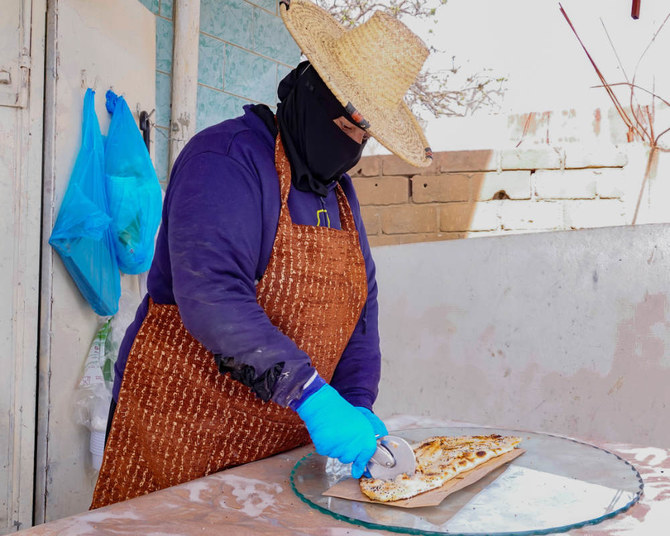 Elham Asiri attracts visitors and locals from around the Asir region with her fresh breads known as mifa and hali, among others.