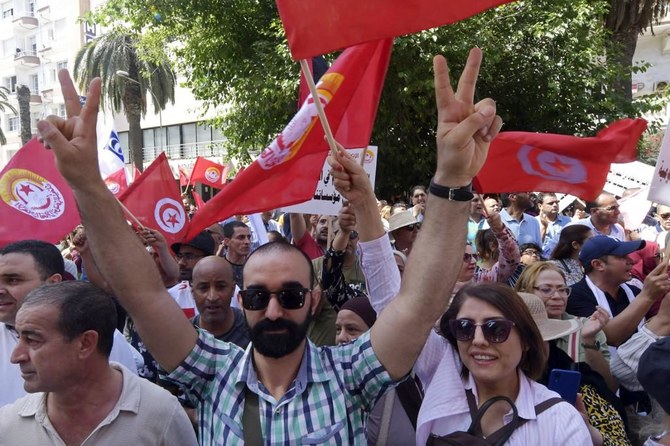 Tunisians protest against constitution referendum as opposition grows