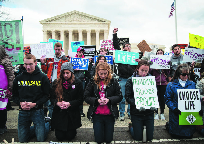 Anti-abortion advocates pray outside the US Supreme Court. (Social media)